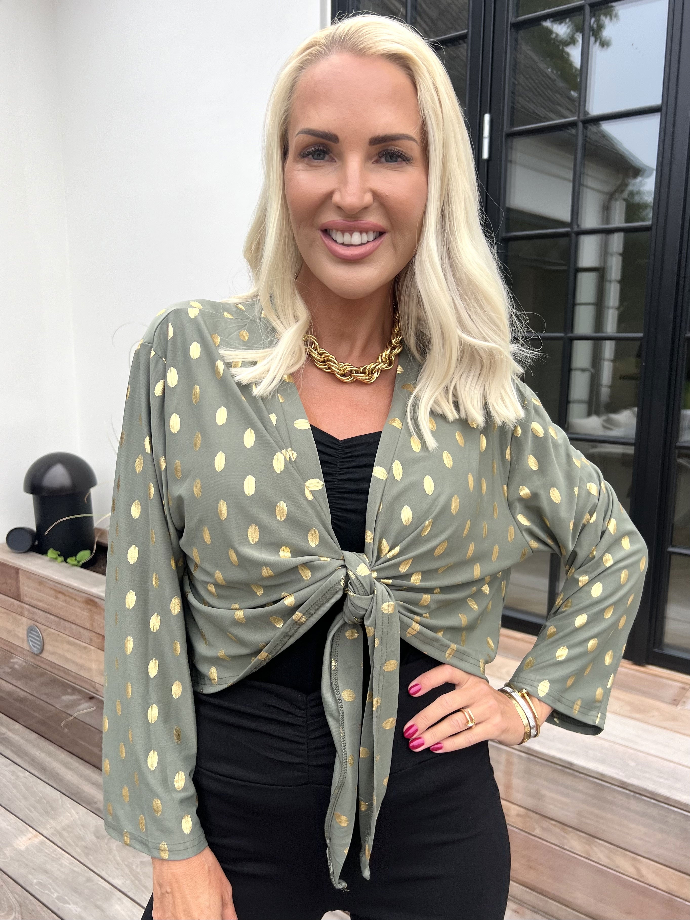 Werena Dot - Kort elastisk cardigan med guld prikker